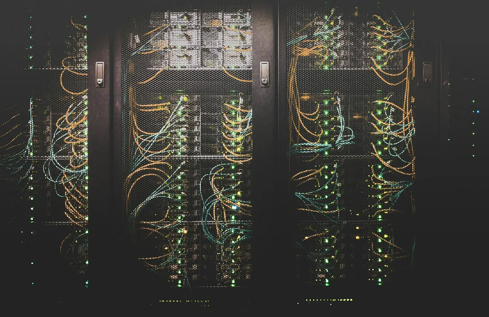 Server racks with network cables and status lights